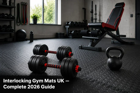 Grey EVA interlocking gym mats covering a UK home garage gym floor with dumbbells and workout bench