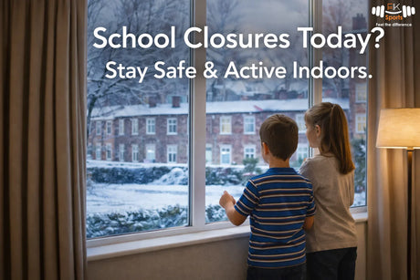 UK family watching snow outside during school closures today, staying safe and active indoors