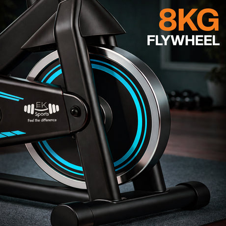Indoor exercise bike with 8KG flywheel and EK Sports branding.