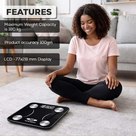 Woman sitting on a floor scale with product features displayed on Digital Body Weighting scale