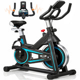 Black and blue stationary bike on a white background