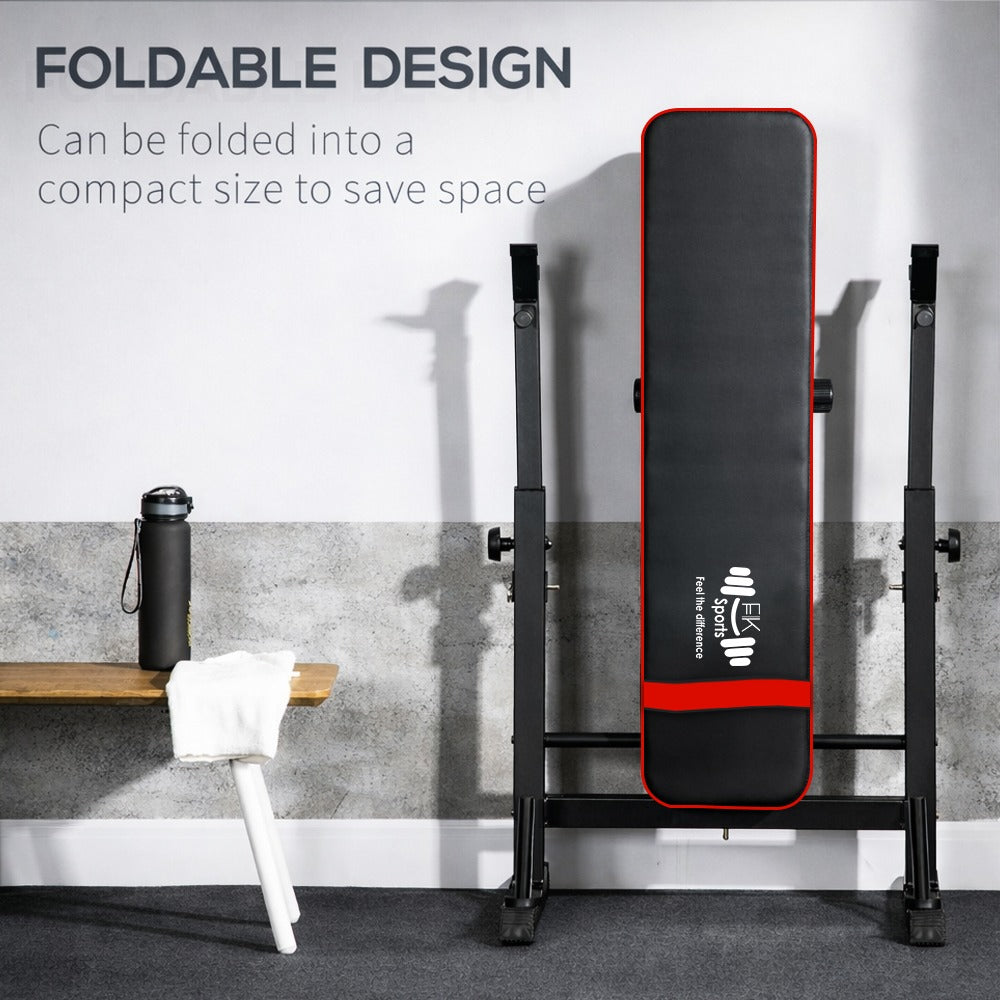 Foldable gym bench with black and red design on a gray floor.