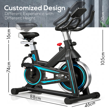Indoor cycling bike with dimensions labeled on a white background