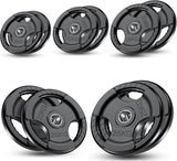 Set of weight plates with varying weights on a white background