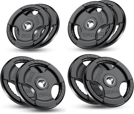 Set of weight plates with different capacities on a white background