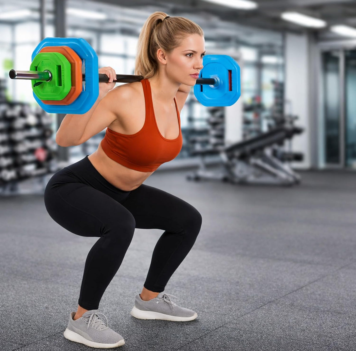 Woman performing squats with a barbell in a gym setting